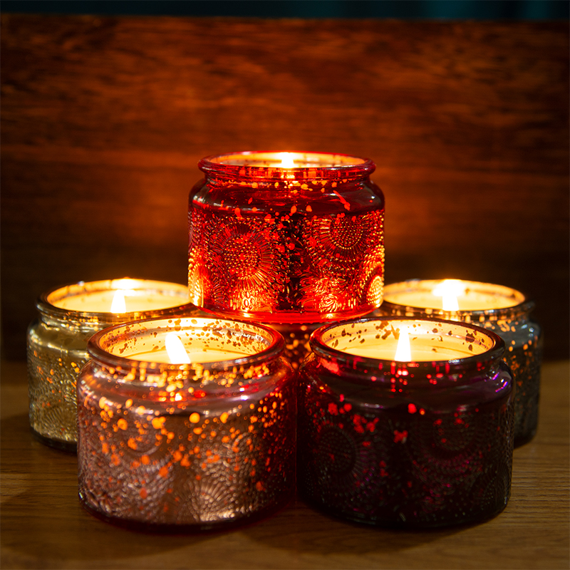 Colorful embossed glass with scented candle cover